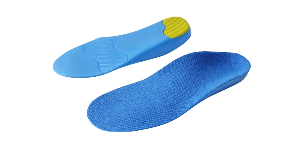 a pair of blue orthopedic insoles. One insole is flipped to reveal its underside, showcasing a yellow, cushioned heel support area and structured arch design, which helps with shock absorption and foot alignment. The top surface of the insoles is a smooth, breathable blue fabric, ideal for placing inside shoes to improve comfort, reduce fatigue, and potentially address mild foot - related issues like flat feet or plantar fasciitis.