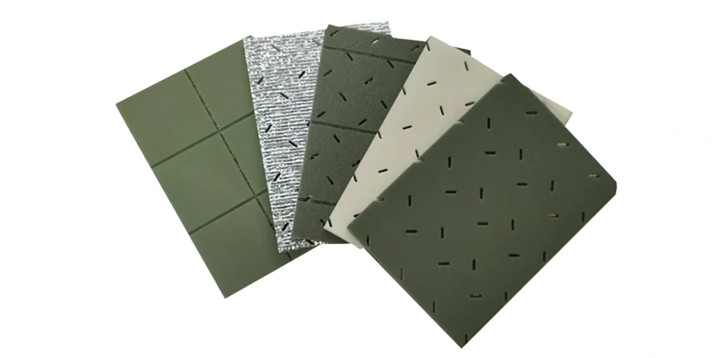AlternativeText: A collection of hexagonal foam pads in grey and yellow hues, with some grey pads having a dotted surface texture. Caption: Hexagonal Foam Pads in Grey and Yellow with Textured Surfaces Description: This image shows a cluster of hexagonal foam pads. The pads are in two colors: grey and yellow. Some of the grey pads feature a dotted texture on their surface, while the yellow pads have a smooth finish. These foam pads likely serve functions such as cushioning, grip enhancement, or protection, highlighting both their aesthetic and practical qualities.
