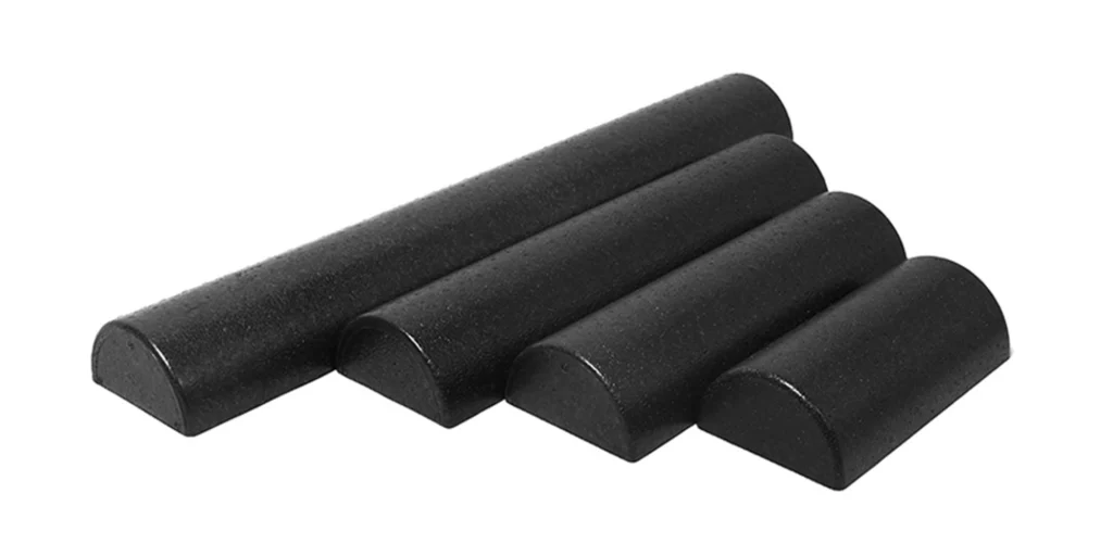 four black cylindrical objects of different sizes, arranged in descending order from left to right. The largest cylinder is on the far left and gradually decreases in size towards the right. They appear to be made of a smooth material with no visible text or patterns.