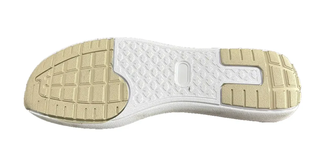 a sole has a dual - tone design, with beige and white sections. It is adorned with various textured patterns, which are likely intended to enhance grip and traction. The overall appearance suggests it is designed for functionality, possibly for casual or athletic footwear.