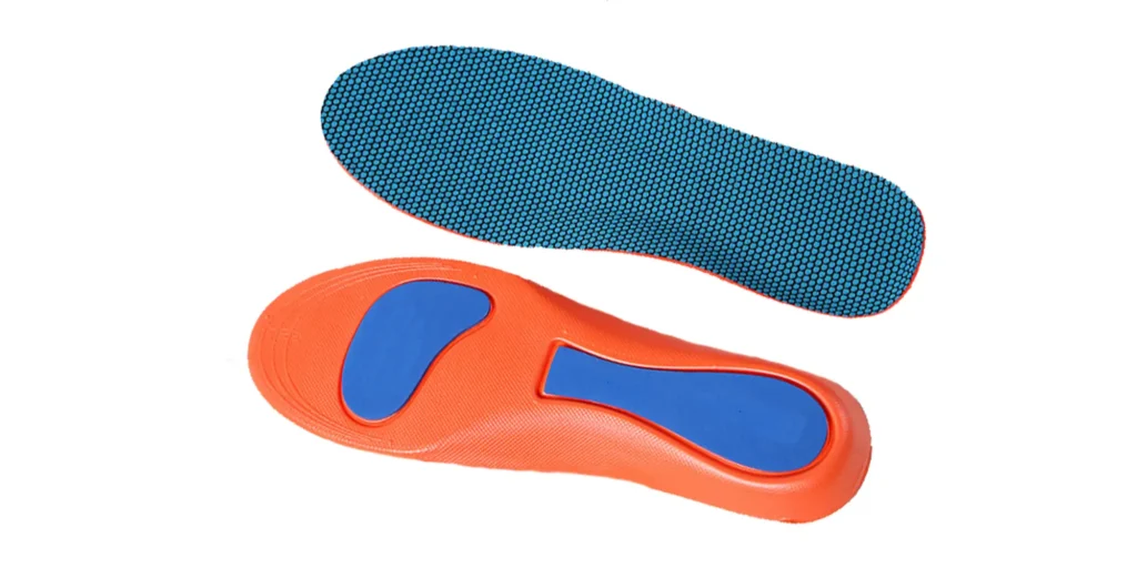 two sports insoles. The top insole has a blue surface with a dotted texture and orange borders, likely for breathability and traction. The bottom insole is orange, equipped with two blue pads—one labeled “Poron Comfort” (indicating shock - absorbing material) and the other “SONG DIAN” (brand/series name). These insoles are engineered to enhance footwear comfort, provide arch and heel support, and reduce impact during physical activities.