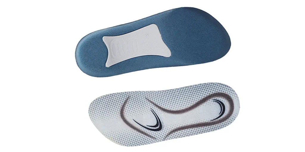 two orthopedic insoles. The upper insole is blue, featuring a white, contoured arch support pad, likely intended to provide stability and relieve pressure on the foot’s arch. The lower insole has a white base with a dotted texture for breathability and curved brown and black patterns, possibly designed to align with foot contours and enhance comfort during movement. Both insoles are crafted to improve footwear ergonomics, aiding in foot health and reducing discomfort.