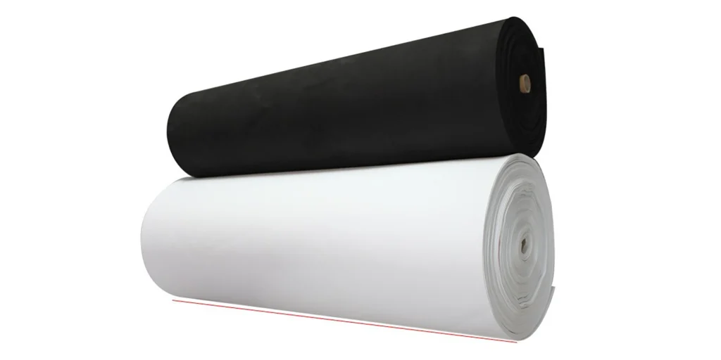 displays two rolls of material arranged in a stack: a black roll placed on top of a white roll. Both rolls appear to be made of a smooth, fabric-like material, and they are presented against a plain white background, which emphasizes their colors and cylindrical shapes. The simplicity of the setup suggests a product display, likely showcasing the two color options of the material.