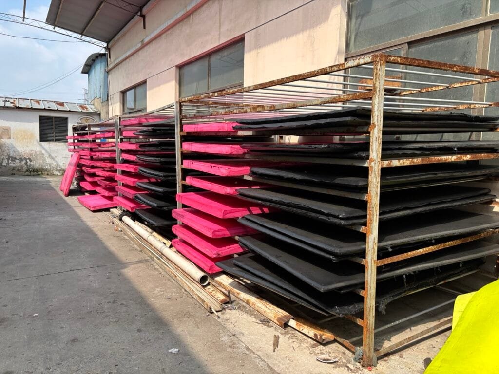 Many EVA sheets are waiting to cool on the racks.